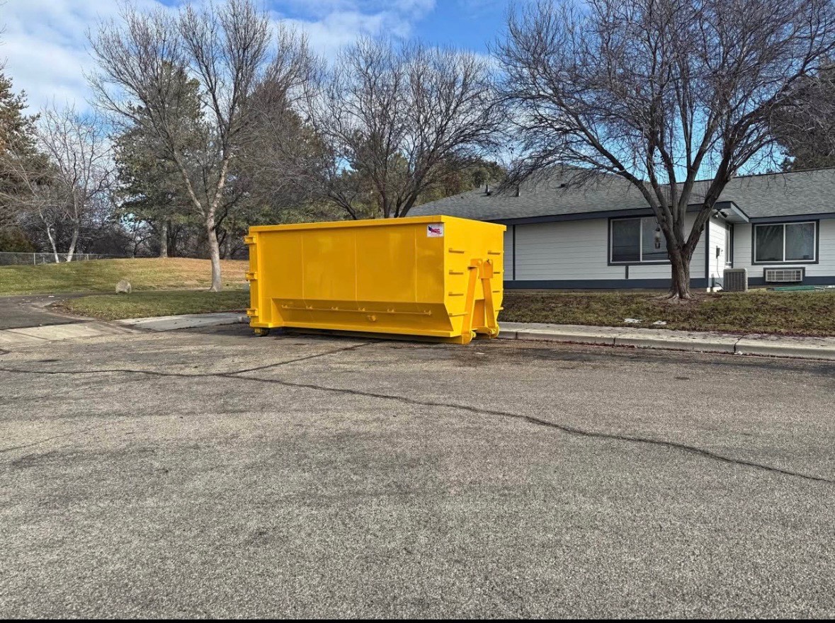 yellow roll off dumpster in iowa city dump it